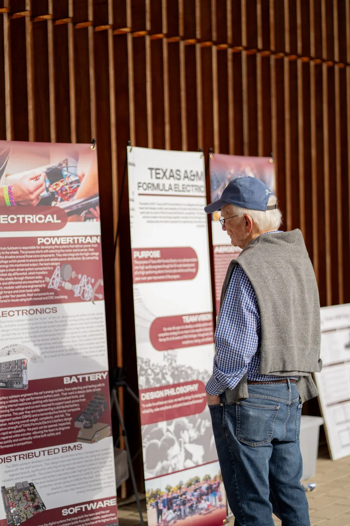A guest reading the team’s Rollout banners