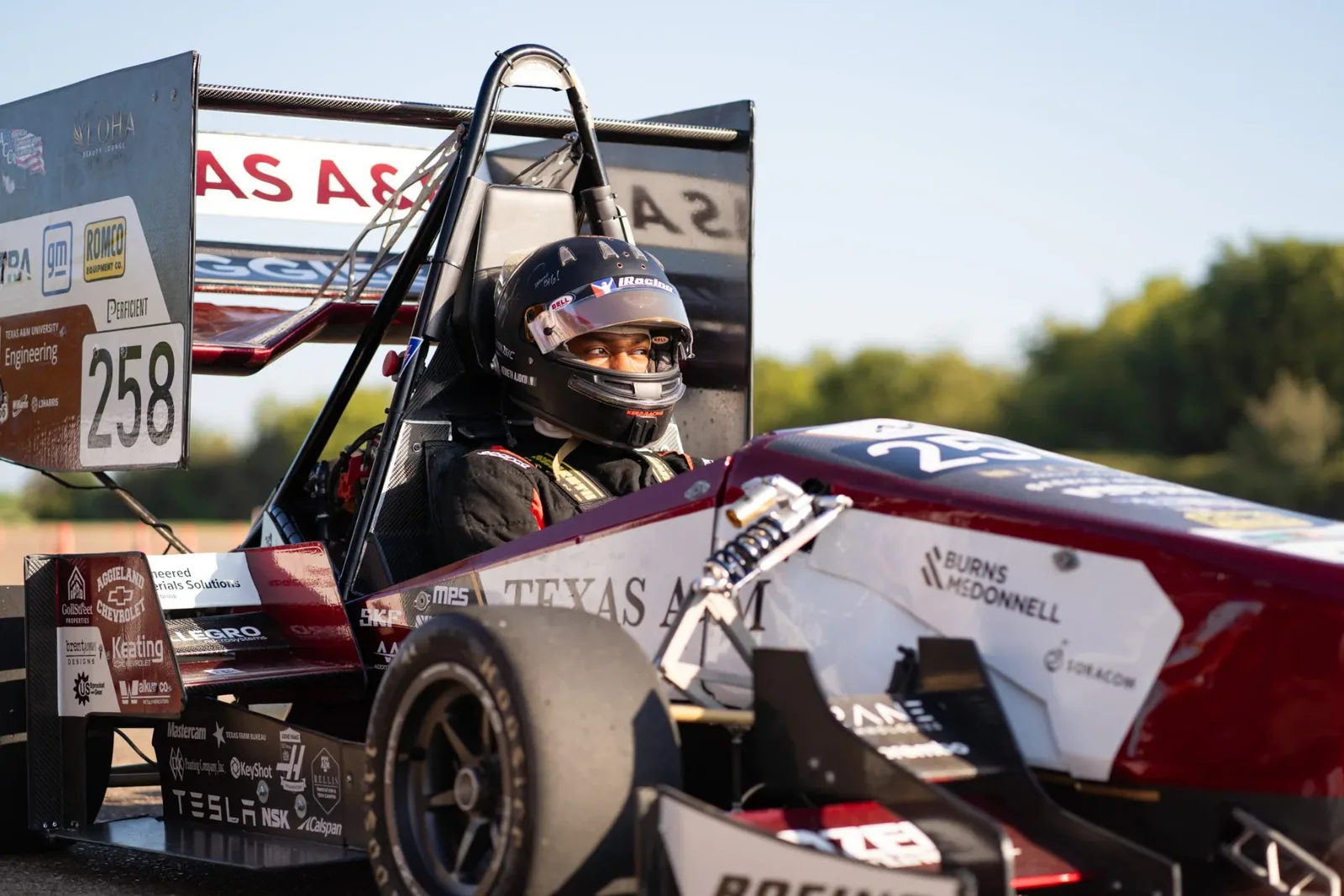 Driver in AME25 on the test lot