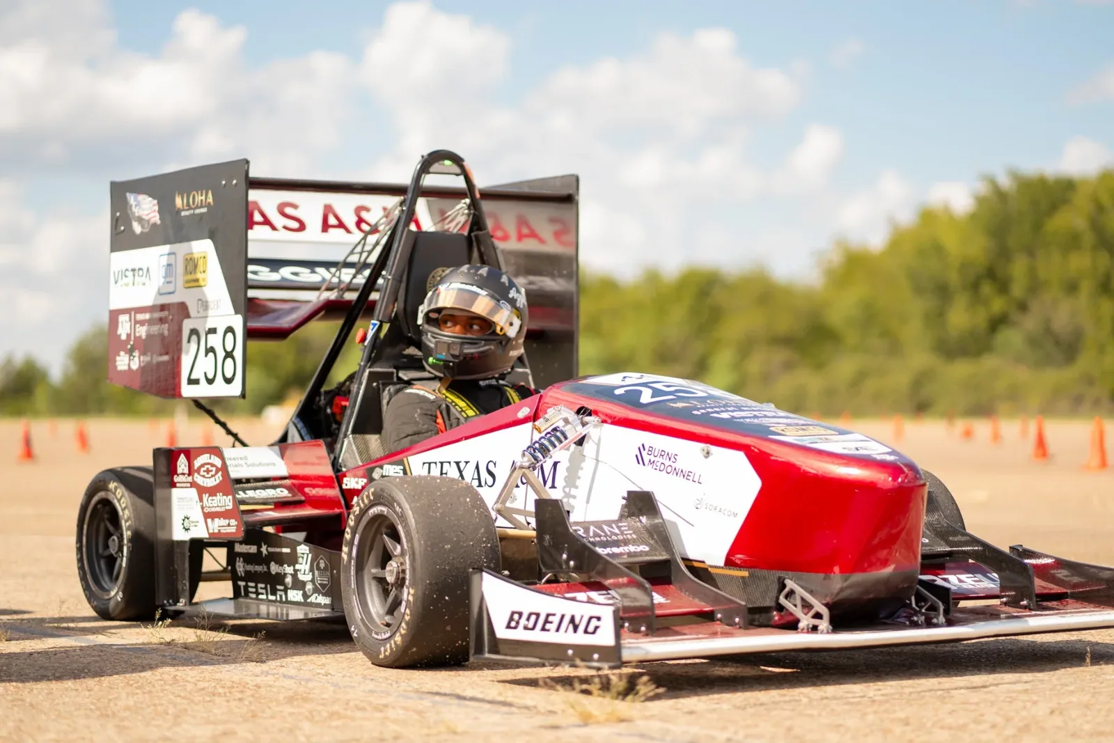 AME25 parked on a dirt lot